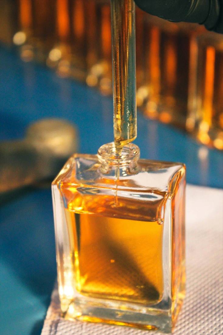 Square perfume bottle with amber fragrance