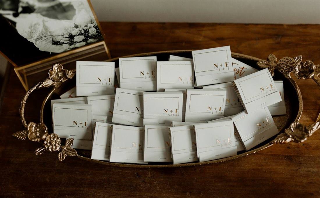 Wedding favour cards on a gold tray